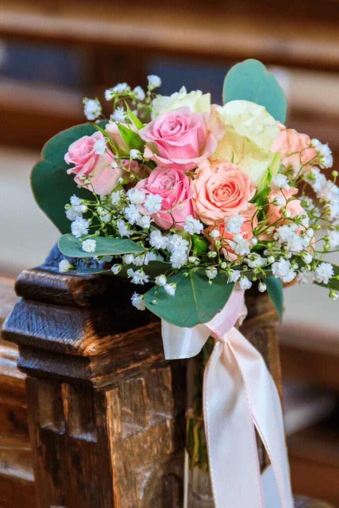 Soft Blush and Eucalyptus Wedding Aisle Decor for an Indoor Chapel